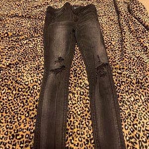 American eagle skinny jeans, with holes.